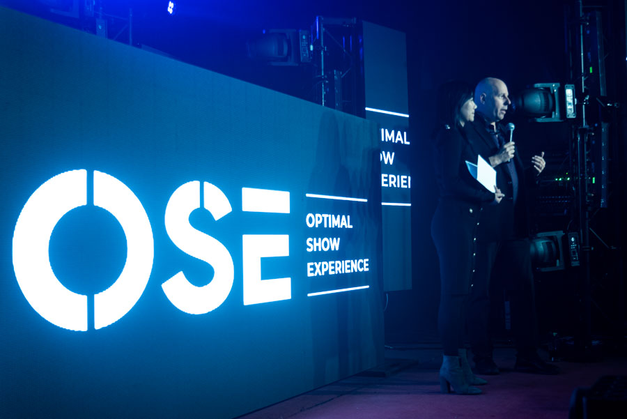 OSE owners on stage announcing Ottawa Special Events rebrand to Optimal Show Experience