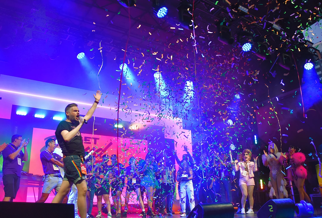 Confetti falls on performers and staff celebrating onstage at Capital Pride